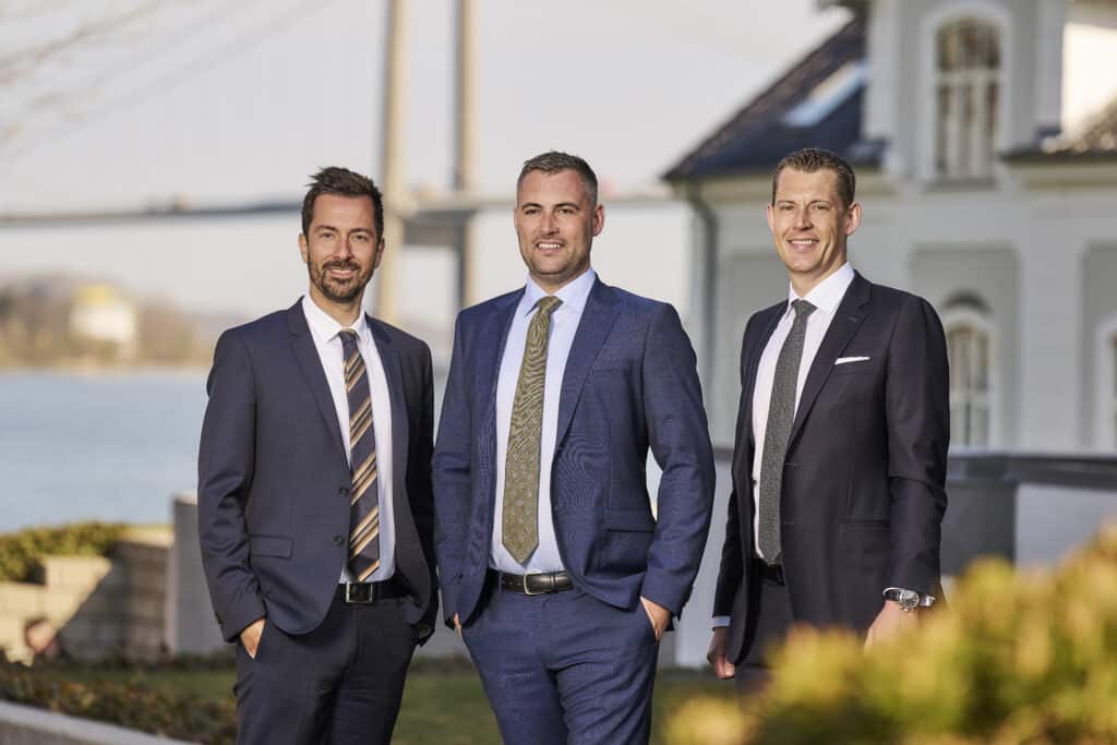 three men in suits