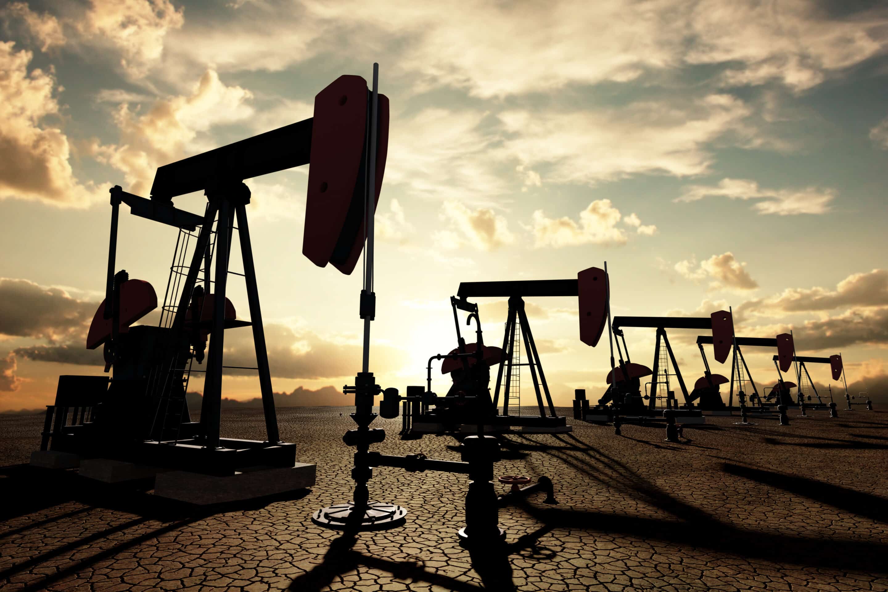Oil pumps on the sunset sky